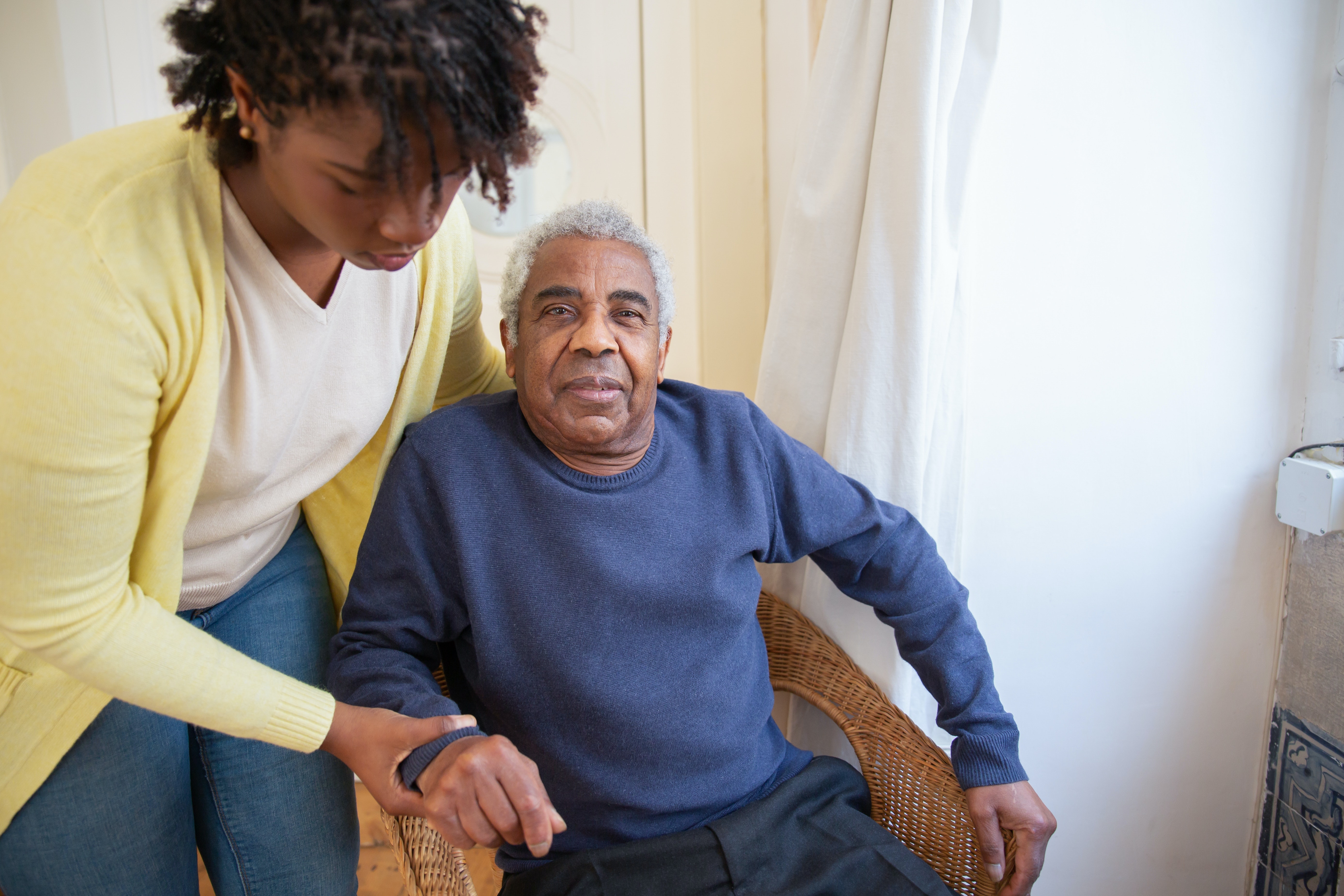 Image of nurse taking care of patient.